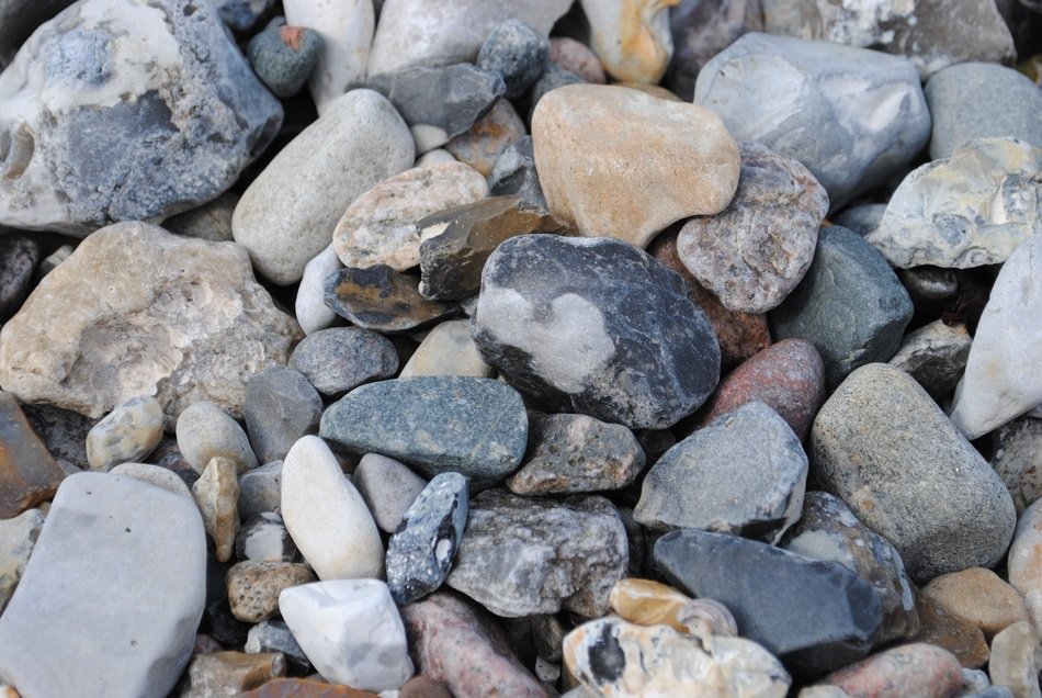 variety of stones on the beach close-up