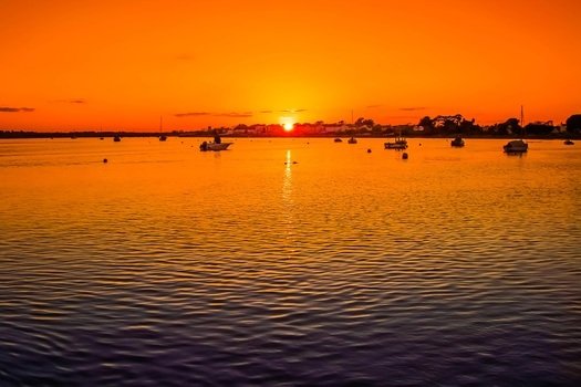 sunset over the ocean in christchurch