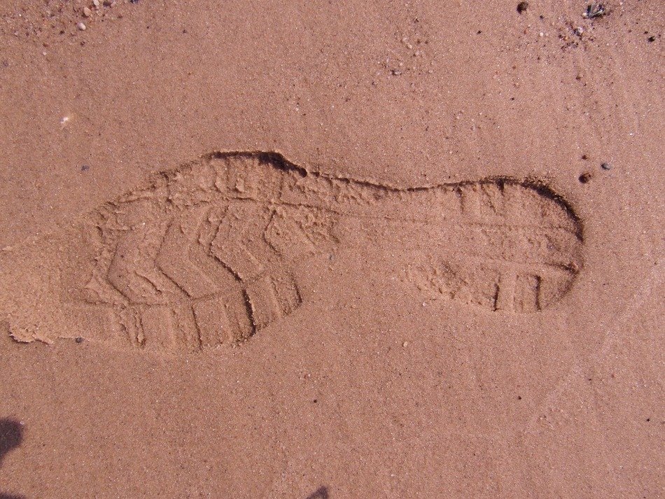 footprint on the sand on beach