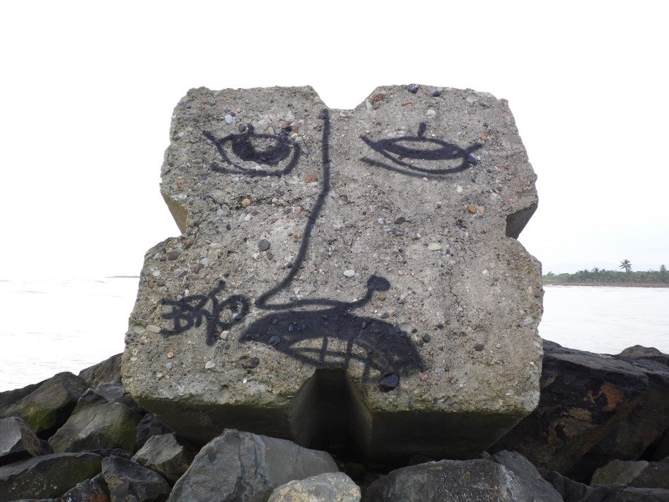 sad face picture on the stone