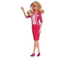 Barbie doll in a pink suit