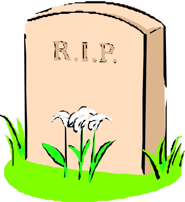 painted tombstone and flowers