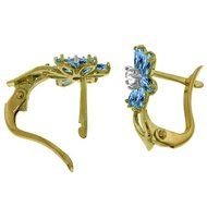 Earring with the blue topaz clipart