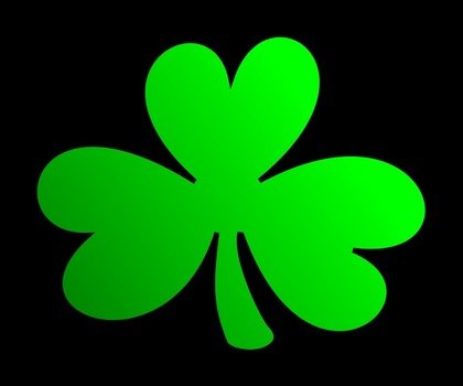 green clover on a black background