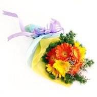 bouquet of flowers in a yellow wrapper