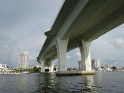 white high bridge over the ocean