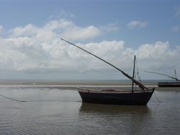 fishing boat on calm water in the ocean