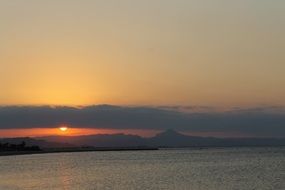 evening sky with sunset over the beach