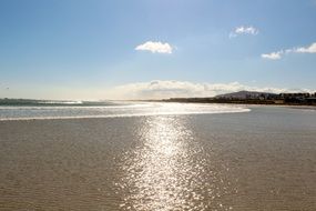 glossy ocean water at beach