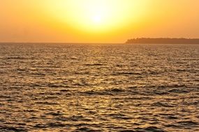 big golden bright sun over the ocean