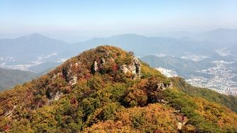 rocky green mountain cheonmasan in the fall