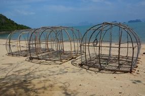 fish baskets on the beach in Thailand