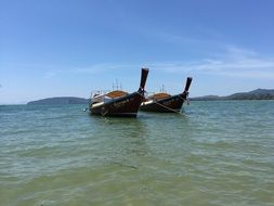 boats on the water in thailand