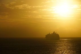 sea ship cruise yellow sunset view