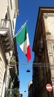 Italy flag on a building wall