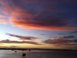 boats at sea at the end of the day