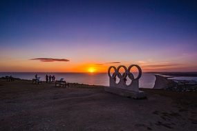 beach with figures at sunset