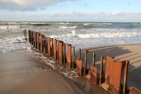 fence on the beach of the Baltic Sea