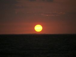 orange sunset over river beach paro