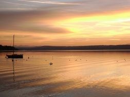 boat on the water at sunset