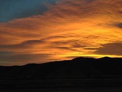 beautiful fire orange clouds at dusk