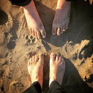 feet of people in the sand