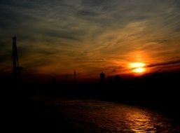 bright orange sun in the dark