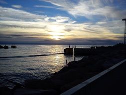 Sunrise over Sea coast rocky beach