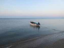 boat is floating on a sea
