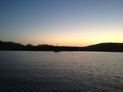 Landscape of calm lake at the sunrise