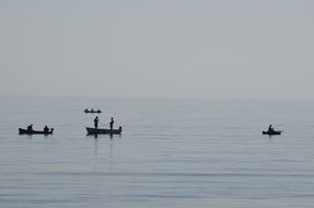 fishermen in boats in the morning