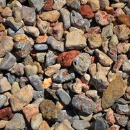 colorful pebbles near the rock