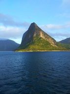 green rock on an island in Norway