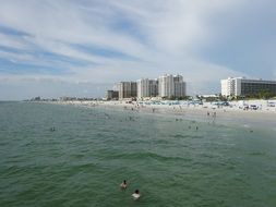 tall building on the sandy ocean coast