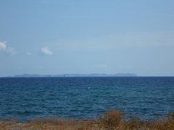 island at horizon in sea, Spain, Balearic Islands, cabrera
