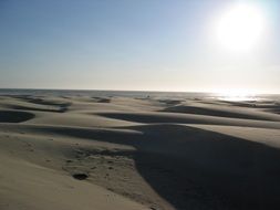 sun over the desert sand