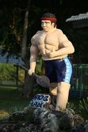 frogman, muscle man statue outdoor