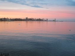 pink glow of sunset over the lake