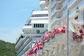 flags on the white ship