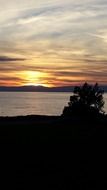 Geneva Lake panorama against the colorful evening sky with the clouds