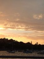 sunset behind the clouds in Sydney