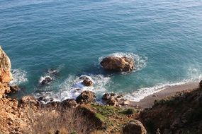 view from the cliff to the blue ocean