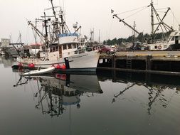 fishing boats on the pier