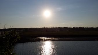 silver reflection of the evening sun in the ocean