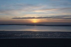 cloudy sunset on the evening beach