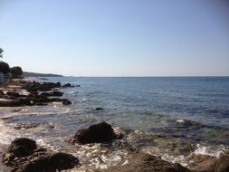 rocky coast by the sea in summer