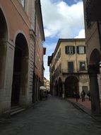 medieval buildings on a street in Tuscany