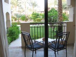 two free chairs on terrace of hotel