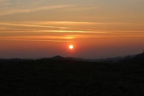 bright sun in the evening sky
