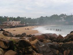 people on the beach in India